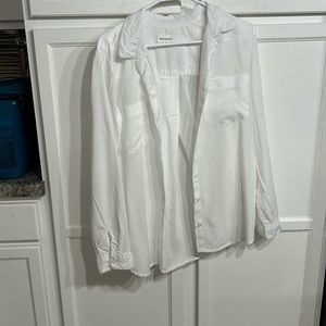 Nice very soft button up blouse that is pleated in the back!